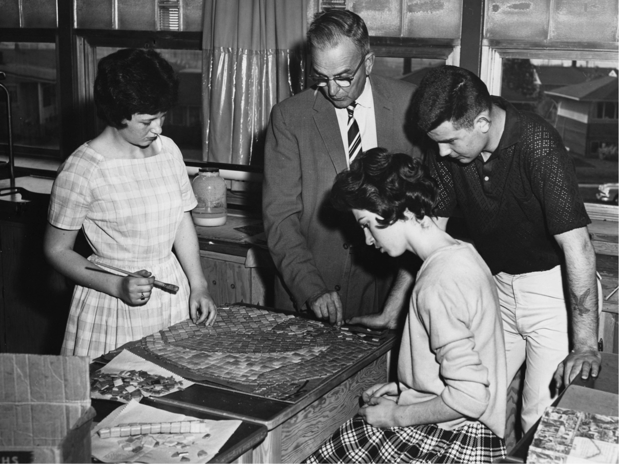 Teacher and students working on a mosaic (1961.)