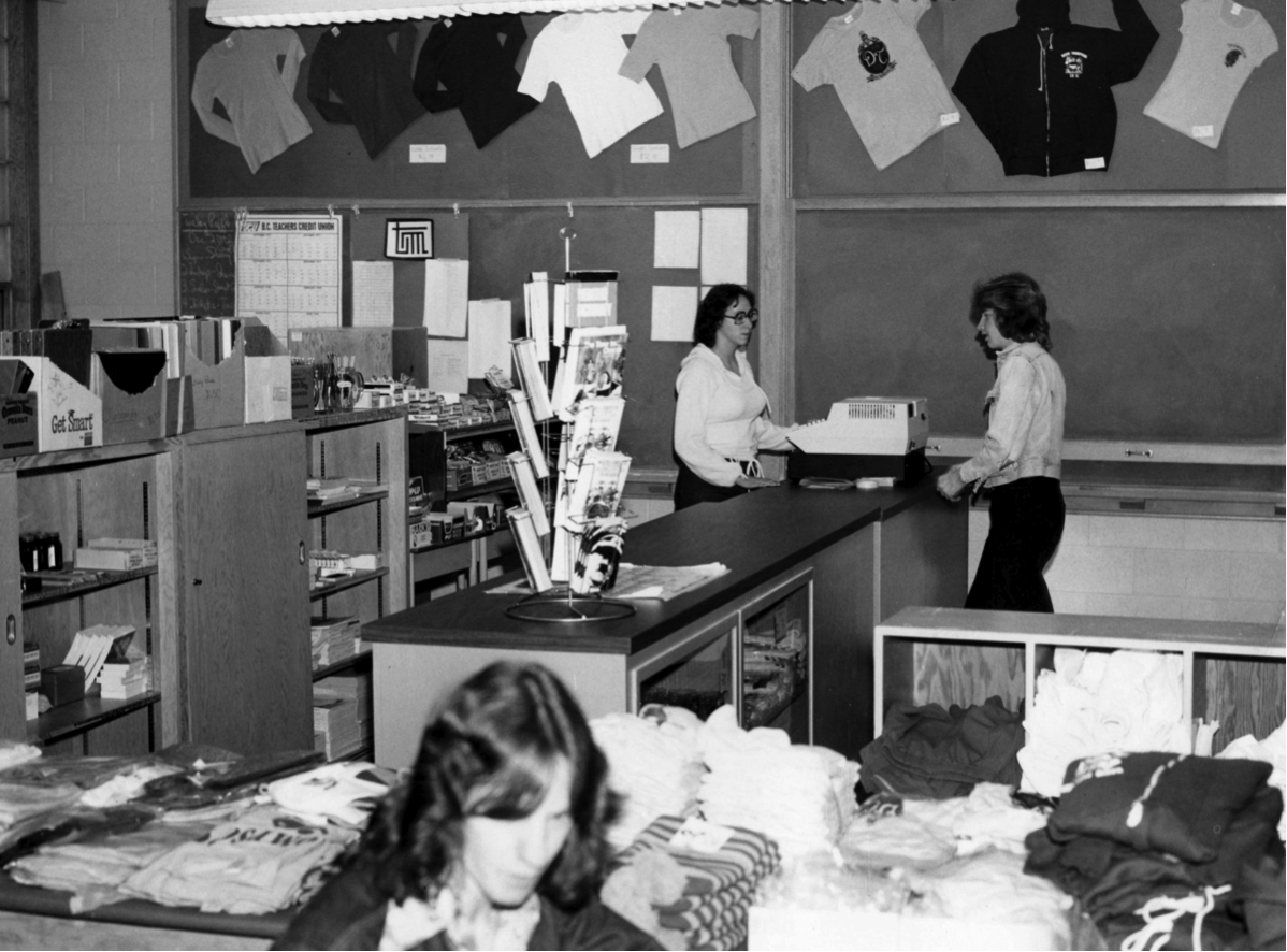 Students sell items at the school store (1978.)